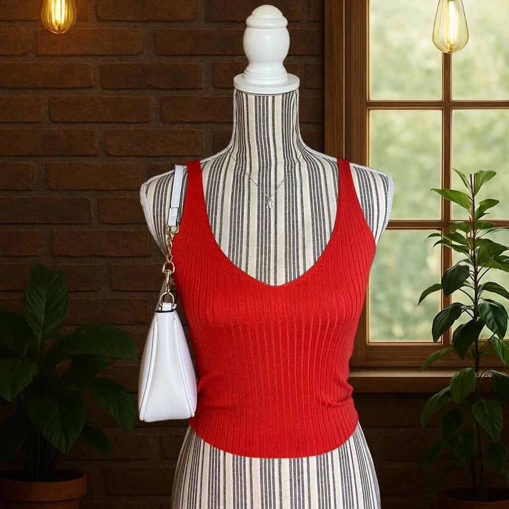 Orange ribbed tank top with built, ideal for a night out